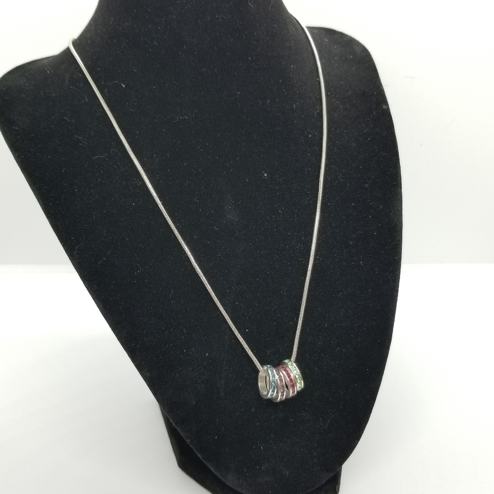 silver tone chain necklace with multicolor rhinestone rings